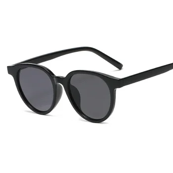 Новые европейские и американские ретро-овальные солнцезащитные очки Женские Трендовые солнцезащитные очки Мужские солнцезащитные очки для международных уличных фотосессий Ветровые очки